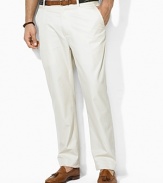 Classic-fitting pants tailored in fine woven cotton, designed with a flat front, narrow leg and washed for a vintage, timeworn appeal. Standard-rise belted waist. Angled hand pockets, split-besom pockets at back. Embroidered pony accents the back right pocket. Zip fly with button closure.