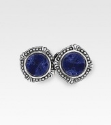 A rich, welcome burst of color in smooth lapis stones, set into engraved sterling silver. ¾ dia Made in USA