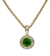 Totally glamorous green. EFFY Collection's beautiful round pendant highlights an emerald center stone (1/3 ct. t.w.) surrounded by diamond accents. Set in 14k gold. Approximate length: 18 inches. Approximate drop length: 1/2 inch. Approximate drop width: 3/10 inch.