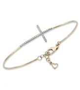 It's a beautiful cross to bear in this YellOra™ wire bracelet. Single-cut diamonds (1/6 ct. t.w.) enhance the appeal of the pure gold, sterling silver and palladium combination. Approximate length: 7-1/4 inches + 1-1/4 inch extender.