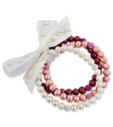 Beauty in bunches. Pink plays a starring role in this set of three cultured freshwater pearl (7-8 mm) stretch bracelets that offer a classic chic feel, with crystals adding luster. Approximate length: 7-1/2 inches.