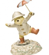 Inspired by the classic film starring Gene Kelly, Winnie the Pooh takes his turn at stomping through the rainy streets in this charming Disney figurine. Accented with 24-karat gold and measures 7.75.