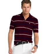 Just breathe. You'll have no problem getting your game face on with this lightweight striped performance polo from Izod. (Clearance)