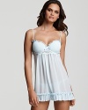 Start your honeymoon right in a pretty pleated babydoll with molded cups and floral embroidered detail.