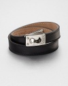 Soft lamb leather with palladium clasp detail.Leather strapLength, about 14.5Made in Italy