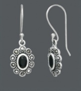 Let your style spell sophistication. Faceted onyx stones (6 mm x 4 mm) pop when framed with the sweet sparkle of marcasite. Genevieve & Grace earrings crafted in sterling silver. Approximate drop: 1-1/4 inches.