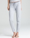 Stretchy pajama pants with banded ankles and a charming ruffle waist.