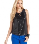 Add sparkle to your wardrobe in this petite sequin tank top from DKNY Jeans. It looks fantastic with the season's colored jeans!