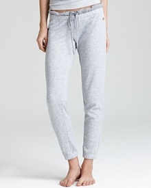 Stretchy pajama pants with banded ankles and a charming ruffle waist.