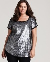 Go for the ultimate glam in this DKNYC sequin-front tunic--a trend-right addition to the new season.