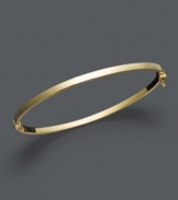 A simple luxury when worn solo, a must-have trend when stacked with others. Bangle features a tube shape crafted in 14k gold. Approximate diameter: 2-3/8 inches.