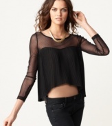 With contrasting sheer swiss dot and accordion pleats, this BCBGeneration boxy top is perfect for a hot urban-edge look!