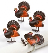 Nothing says Thanksgiving like Phil the Turkey napkin rings. Plump birds with plumes of red, orange and brown will put dinner guests in the mood to gobble it up. (Clearance)