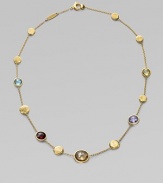 A colorful array of faceted semi-precious gemstones, interspersed with freeform discs of 18k gold, creates a look of modern grace. Multi gemstones 18k yellow gold Length, about 16½ Lobster clasp Made in Italy Please note: Stones may vary.