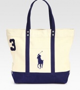 A sporty reincarnation of the iconic polo shirt, this twill cotton tote is adorned with an applied 3 and Ralph Lauren's Big Pony.Zip closureDouble top webbed handlesAdjustable, removable shoulder strapExterior patch pocketApplied twill 3 at the sideAccenting metal grommets at the handles and sidesRoomy interiorReinforced flat bottomCanvas14W x 12H x 6DImported