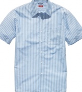 Create a longer, leaner look with the fine lines of this short-sleeved shirt from Izod.