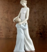 In Spain's renowned Lladró workshops, talented artisans create porcelain sculptures of the highest artistic and technical quality. This Lladró creation is made of fine porcelain, handpainted and glazed to express a special moment. Stands 14-1/2 tall.