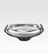 Crafted from stunning metal alloy, this lovely bowl artfully frames whatever you put in it with a gently curling lip, glossy shine and graceful pedestal base. From the Anvil Collection Iron-finish metal alloy 2-quart capacity 14¼W X 4H X 10D Hand wash Imported 