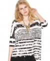 Distressed stripes, boxy shape & asymmetrical hi-lo hem makes this Kensie top a hot pick for an edged-up summer look!