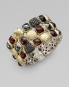 From the Chiclet Collection. A beautiful blend of faceted garnet and black onyx stones, pavé black diamonds and multi-texured 18k gold chiclets. Garnet and black onyxBlack diamonds, 1.4 tcw18K goldLength, about 7.5Push clasp closureImported 