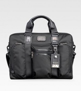 A slim design tailor-made for easygoing professionals in signature ballistic nylon with interior organization and plenty of room for papers and files. Zip closure Top handles Adjustable shoulder strap Exterior zip pockets Interior zip, slip pockets Nylon with leather accents 16W X 12H X 5D Imported 