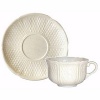 In 1821, Gien was founded for the purpose of bringing fine English earthenware manufacturing techniques to France. Pont Au Choux White is an ivory dinnerware collection with intricate inlaid design work.