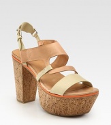 Two-tone leather upper and an adjustable slingback top a chunky, painted cork heel. Cork heel, 4½Cork platform, 2Compares to a 2 heelLeather upperLeather liningRubber soleImportedOUR FIT MODEL RECOMMENDS ordering true whole size; ½ sizes should order the next whole size up. 