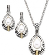 A match made in heaven. Oval-shaped pearls (7x5 mm) serve as the focal point for a sterling silver and 14k gold pendant with 18-chain, and gorgeous matching earrings. Earring drop measures approximately 1 inch.