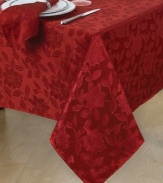 All-in-one elegance. With a tablecloth and napkins to match, this Dinner Party Noel set is the perfect foundation for holiday feasts. Featuring machine washable fabric with a pretty red sheen and classic florals.