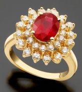 Celebrate July with a stunning birthstone in an ebullient setting. This Effy Collection(tm) ring features oval-cut ruby (1-9/10 ct. t.w.) and round-cut diamond (1 ct. t.w.) set in 14k gold.