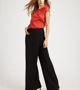 EXCLUSIVELY AT SAKS. A simply stunning interpretation of the classic wide-leg pant, constructed with fluid lines and a sleek wrap-front panel.Button-front wrap panelWide waistbandWide legsSide zipperRise, about 11Inseam, about 3570% polyester/30% rayonDry cleanImportedModel shown is 5'10 (177cm) wearing US size 4.ABOUT THE DESIGNER Former fourth-grade schoolteacher Kara Laricks always told her students to be true to themselves. 