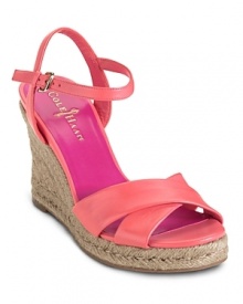 A must-have sandal with a high jute wrapped wedge heel heightens your style and lengthens legs. From Cole Haan.