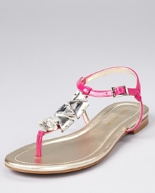 Dazzling triangular crystals line the front of a gleaming sandal silhouette from Enzo Angiolini.