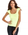 With strong shoulders, this solid BCBGMAXAZRIA top is perfect for a simple yet chic look!