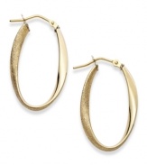 The perfect mix of texture and polish, these 14k gold hoop earrings feature a twisted design and chic, oval shape. Earrings secure with a lever backing. Approximate diameter: 1-1/6 inch.