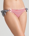 Sail away to your personal paradise in this nautical striped bikini from Nanette Lepore.