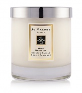 Immerse yourself in a mesmerizing sea of wild flowers, misted with dew. Fresh bluebell, radiant lily of the valley and exquisite eglantine, showered with the sparkling succulence of persimmon and lemon. The Wild Bluebell Home Candle infuses any room with evocative scent and lasts for hours. An everyday luxury, it brings warmth to any environment. Candle burn time is 45 hours. Lid included. 7 oz. 