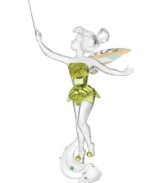 Looking ever so magical in Swarovski crystal, Disney's Tinkerbell figurine takes flight and raises her wand, sprinkling pixie dust on lost boys and girls everywhere.