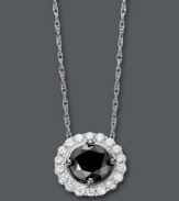 Sparkle that makes a statement. A round-cut black diamond (1/3 ct. t.w.) stands out against a ring of round-cut white diamonds (1-5/8 ct. t.w.). Setting and rope chain crafted in 14k white gold. Approximate length: 18 inches Approximate drop: 3/8 inch.