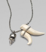 Swarovski crystal accented skull and tusk-shaped pendants on a link chain. BrassSwarovski crystalsLength, about 27Pendant size, about 2 and 1½ Lobster clasp closureMade in Italy