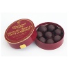 Dark chocolate enrobed truffles filled with a ganache center made with port and cranberries.