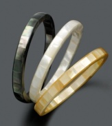 For the love of layering, you'll adore the way these multicolored Mother of Pearl bangles (10-11 mm) accentuate your look. This three bracelet set comes in black, white and bronze hues with an easy slip-on style for ultimate versatility. Approximate diameter: 2-1/2 to 2-3/4 inches.