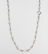 From the Bijoux Collection. A textured chain of sterling silver is illuminated by glistening pearls; wear it long or doubled-up for ultimate versatility.Cultured freshwater, naturally colored pearls Sterling silver Chain length, about 40 Toggle clasp Imported