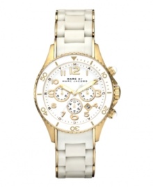 Distinct styling by Marc by Marc Jacobs creates a watch perfect for corporate and casual life. Gold ion-plated stainless steel bracelet wrapped with white silicone. Round gold ion-plated case with white turning bezel. White chronograph dial features outer logo ring, gold tone numerals at markers, date windows, three subdials, luminous hands, logo and gold tone accents. Quartz movement. Water resistant to 50 meters. Two-year limited warranty.