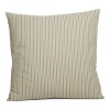 A herringbone stitch in raised, striped bands adorn this neutral-hued decorative pillow.