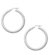 Nothing says classic style like a chic pair of hoop earrings. Studio Silver's style is crafted from thick sterling silver. Approximate diameter: 1-1/2 inches.