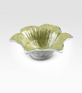 The gentle curves of a blossoming lily are handcrafted in sandcasted metal, then colored with an enamel made from crushed, opalescent mother-of-pearl. Food safe Engraved signature 1½H X 4 diam. Hand wash Imported 