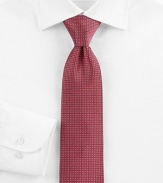 A savvy, sophisticated look woven in Italian silk, with a geometric pattern detail.SilkDry cleanMade in Italy