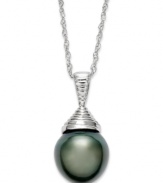 Richly colored and precisely detailed, this cultured Tahitian pearl pendant (10-11 mm) adds an element of elegance and sophistication to any look. Set in sterling silver. Approximate length: 18 inches. Approximate drop length: 1 inch. Approximate drop width: 3/8 inch.