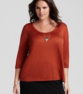 A classic scoop neck flatters the décolleté in this Eileen Fisher basic three-quarter sleeve tee--a must-have for seasonal layering.